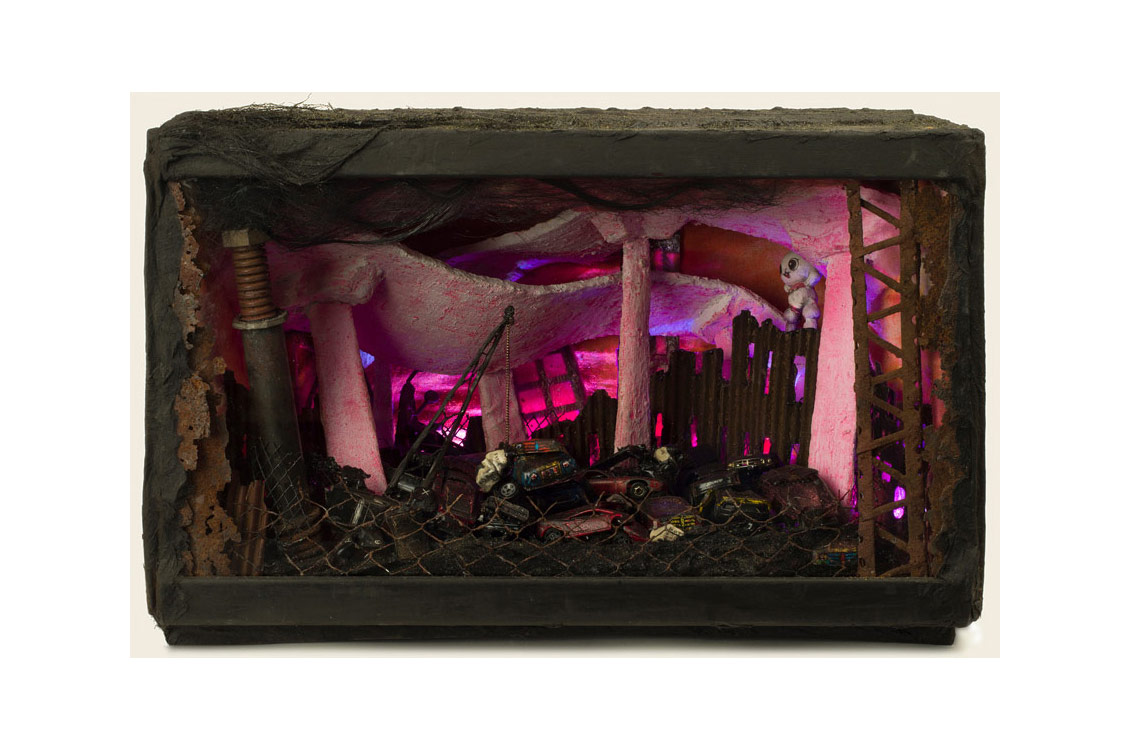 diorama of a dilapidated industrial scene backlit with pink lighting
