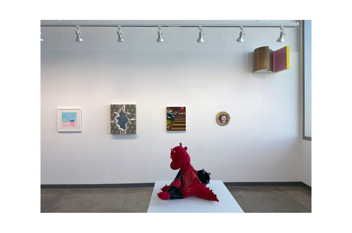 installation view with sculpture at center of image