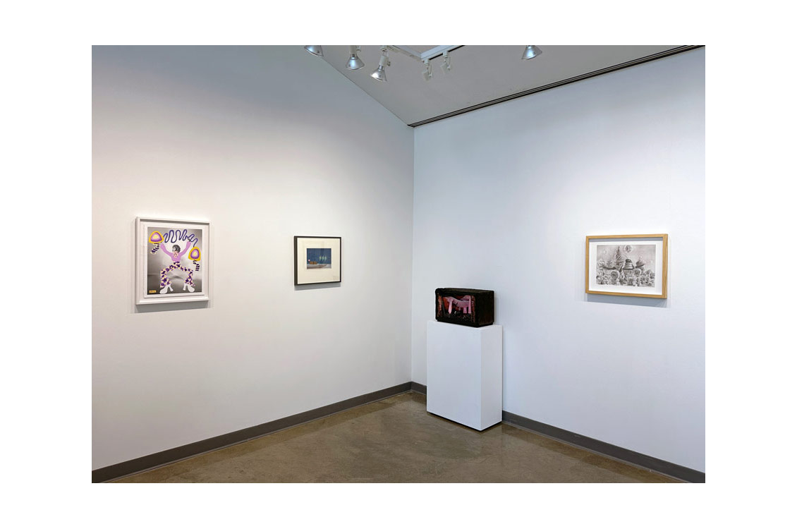 installation view of paintings on wall and diorama on pedestal