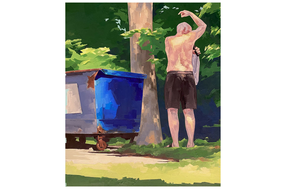 A shirtless person in black shorts dries off with a towel near a blue dumpster and tree, surrounded by sunlit greenery.