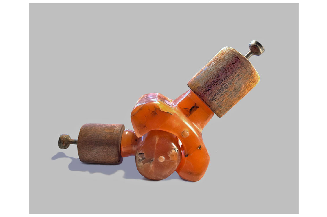 Abstract orange resin sculpture with two rusted cylindrical attachments.