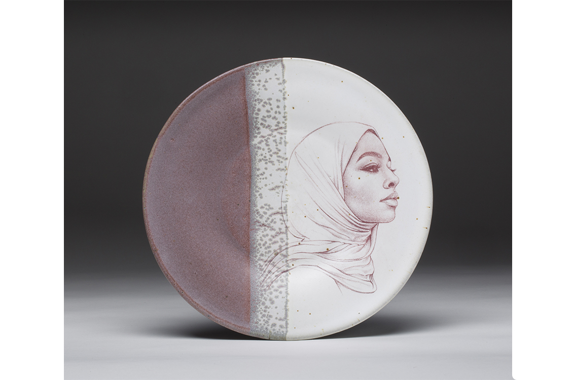 ceramic plate with portrait of a woman in a headscarf