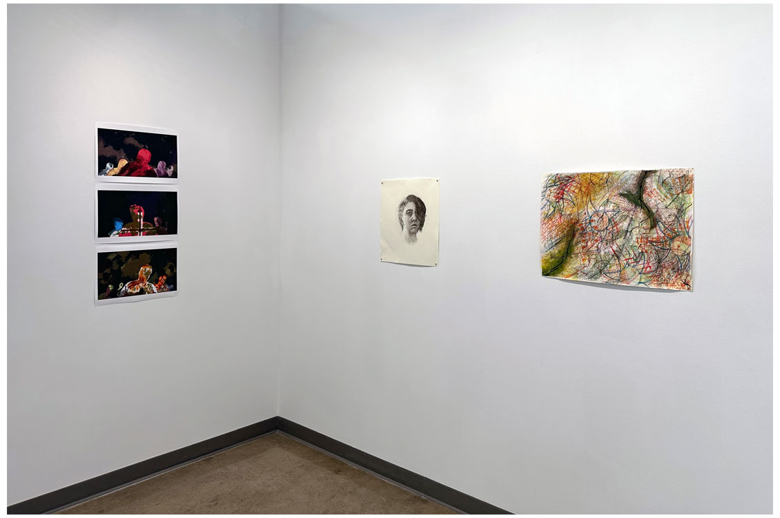interior gallery view with three paintings on display