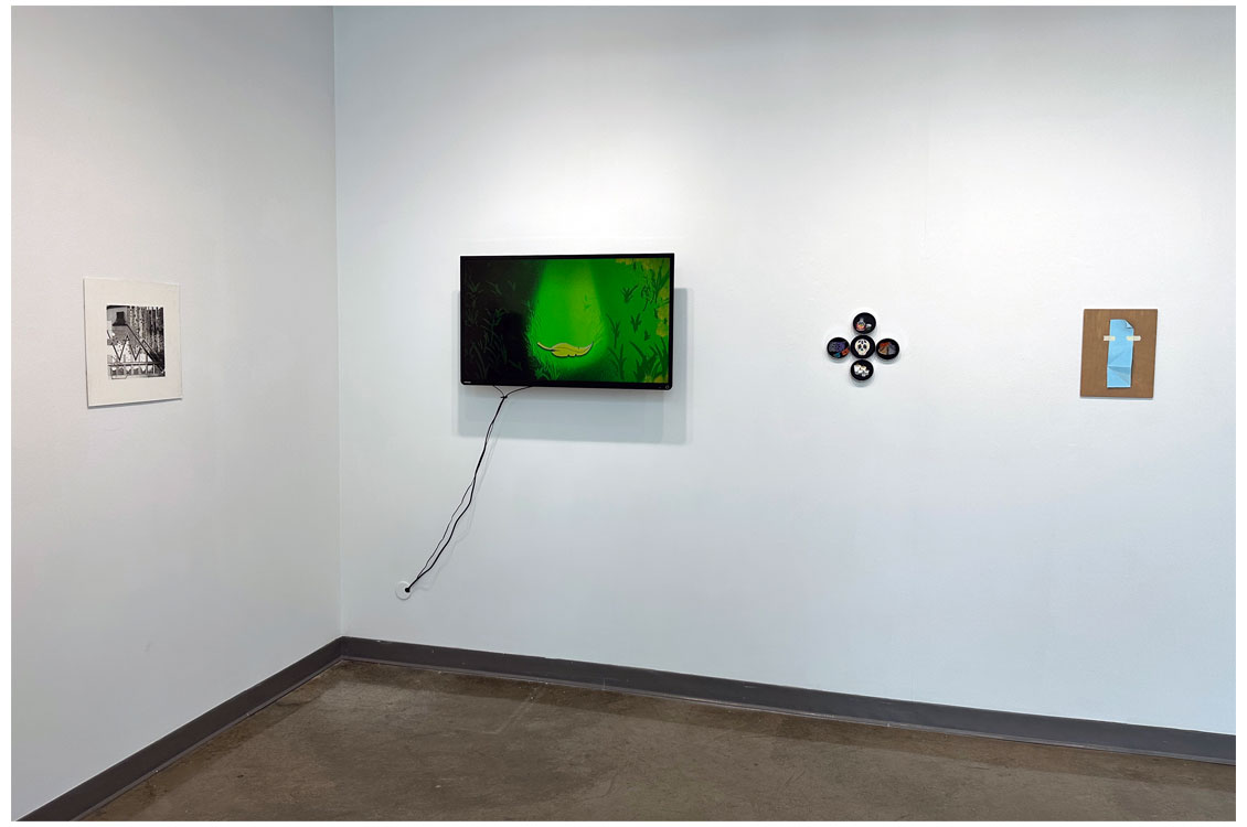 interior gallery view showing television with changing images