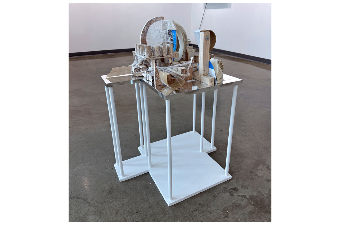 a sculpture made of formed paper in geometric shapes