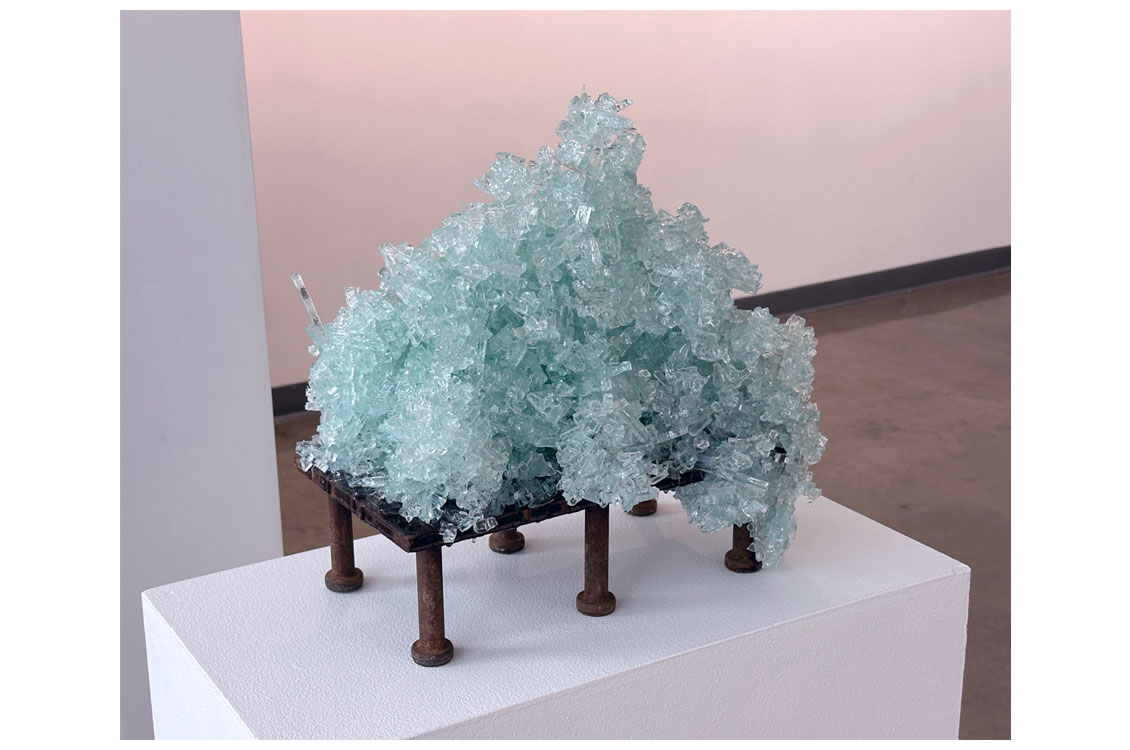 a translucent blue crystal sculpture