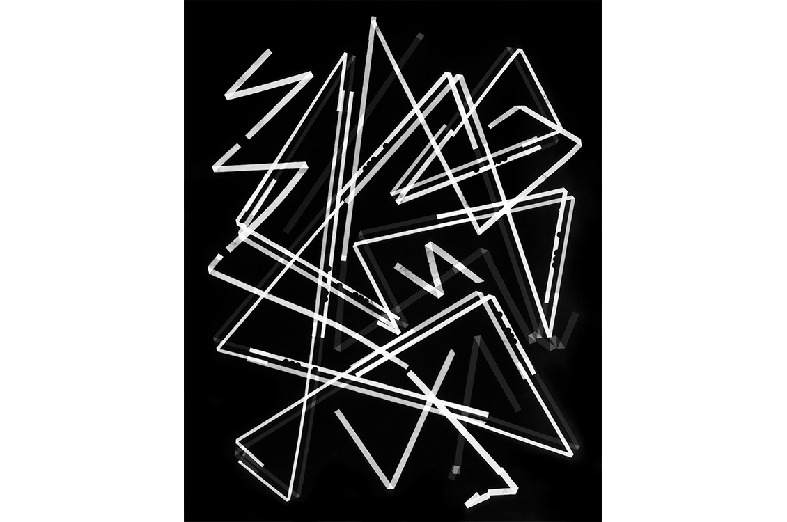 White and gray lines on a black background, some intersecting in triangle shapes.