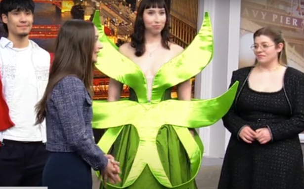 A Harper student shows off an audacious green dress