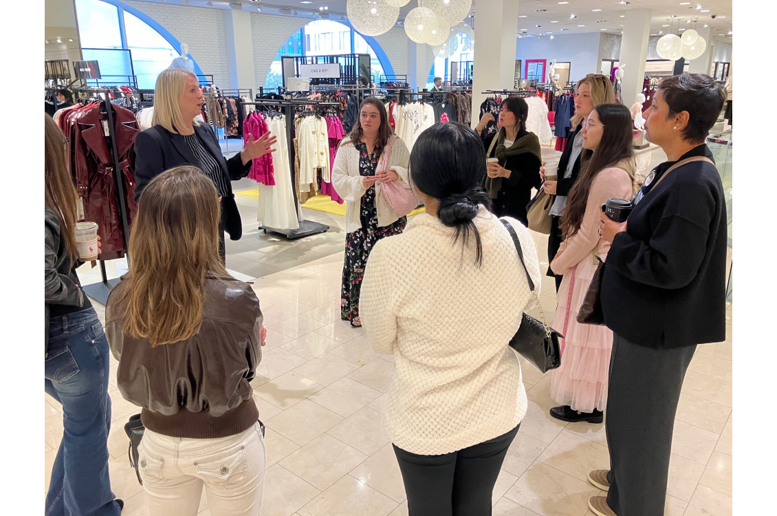 Neiman Marcus store manager explains visual marketing principles to Harper fashion studies students.