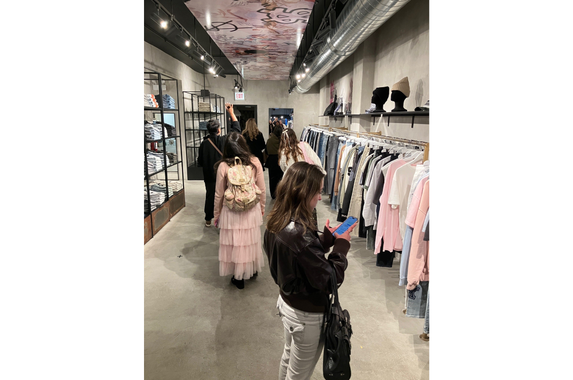 Fashion Studies students check out the store layout, interior design, lighting, shelving and clothing displays at streetwear brand Ksubi.