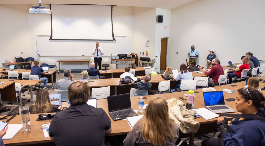 Students in Harper's Drone Program listening to an informative lecture while seated in a lecture hall on campus in Palatine, Illinois.