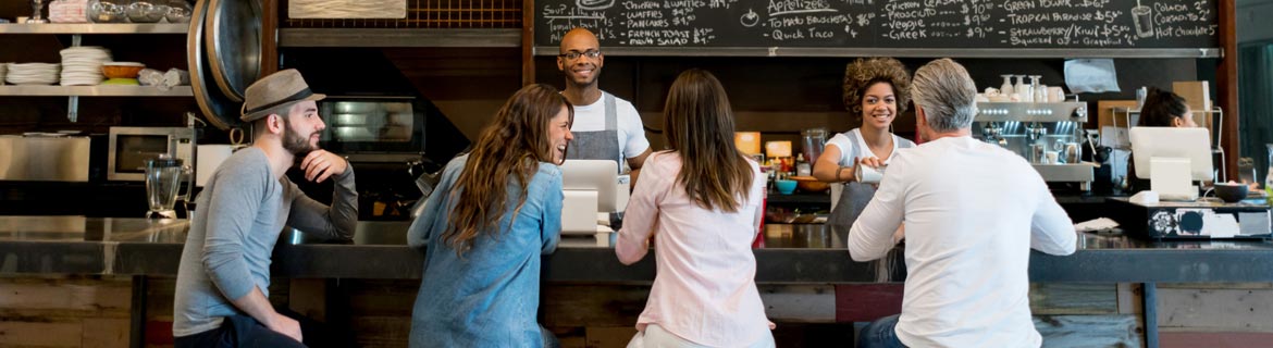 Customers are served at a restaurant cafe.