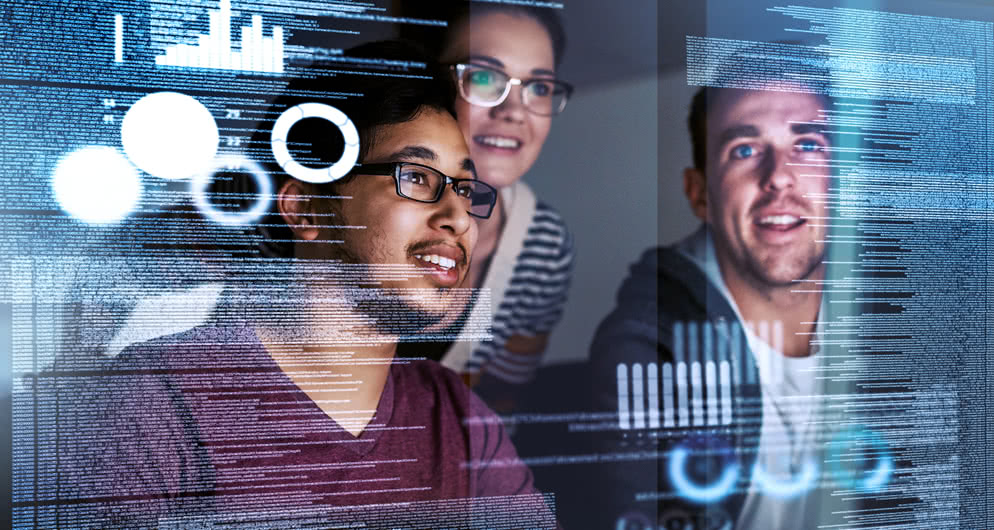 IT students viewing data from a holographic computer interface.