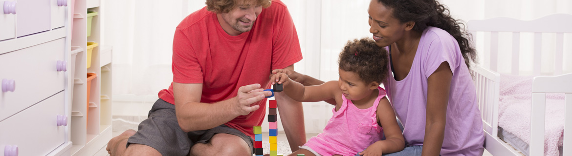 Man and woman playing with children