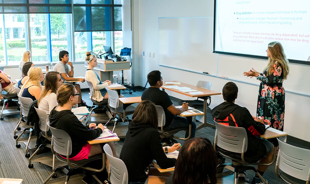 High School students listen to lecture