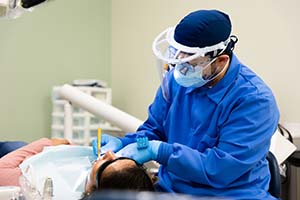 Dental hygienist with a patient