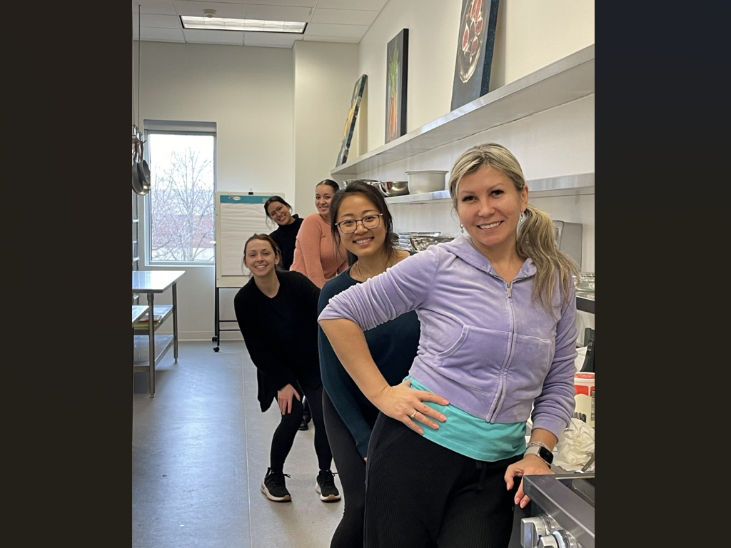 Students in the Nutrition Lab pose in the food prep area