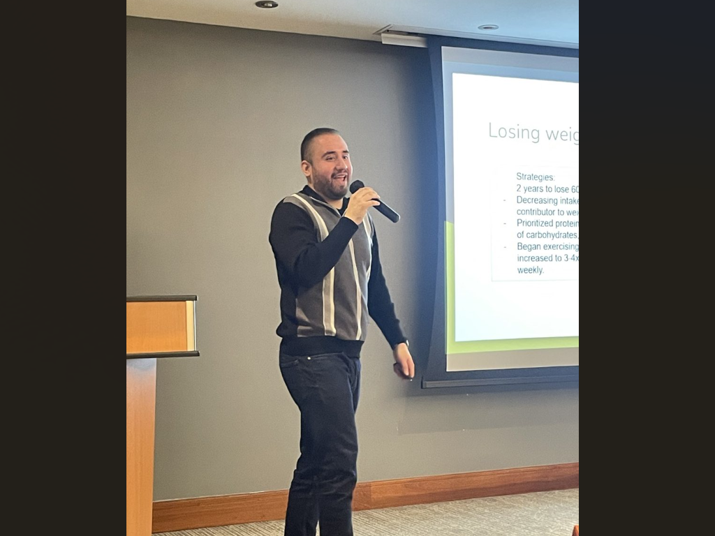 Dietetic Internship student gives a powerpoint presentation to a class