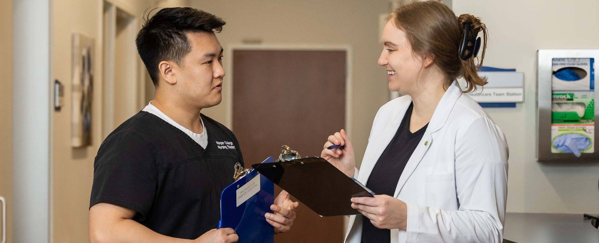 Healthcare Administration and Medical Assistant students simulate a professional doctor's office environment in the medical learning facility on Harper College's campus in Palatine, IL.