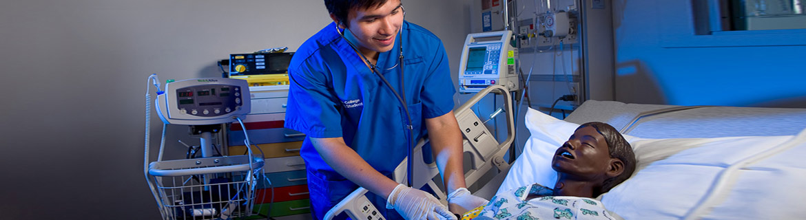 Nursing RN student practices on patient simulator