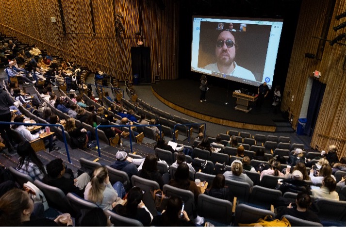 Student audience at Immersion day listening to speaker Marcus Engel