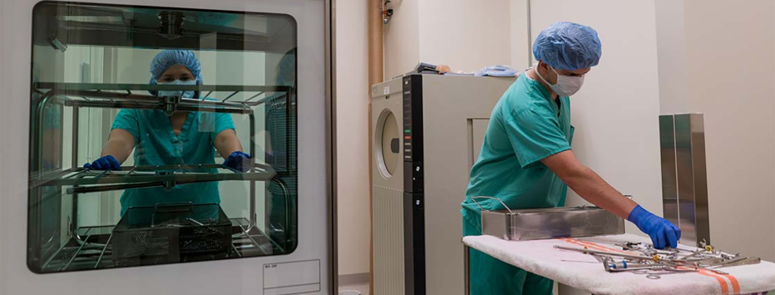 Students sterilizing and preparing surgical tools in the Surgical Technology Suite located at Harper College's campus in the Chicago suburbs.
