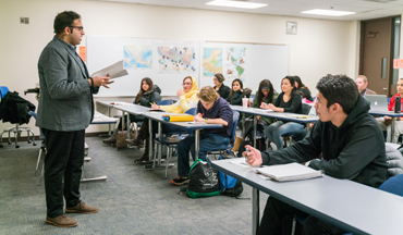 teacher in a classroom with students