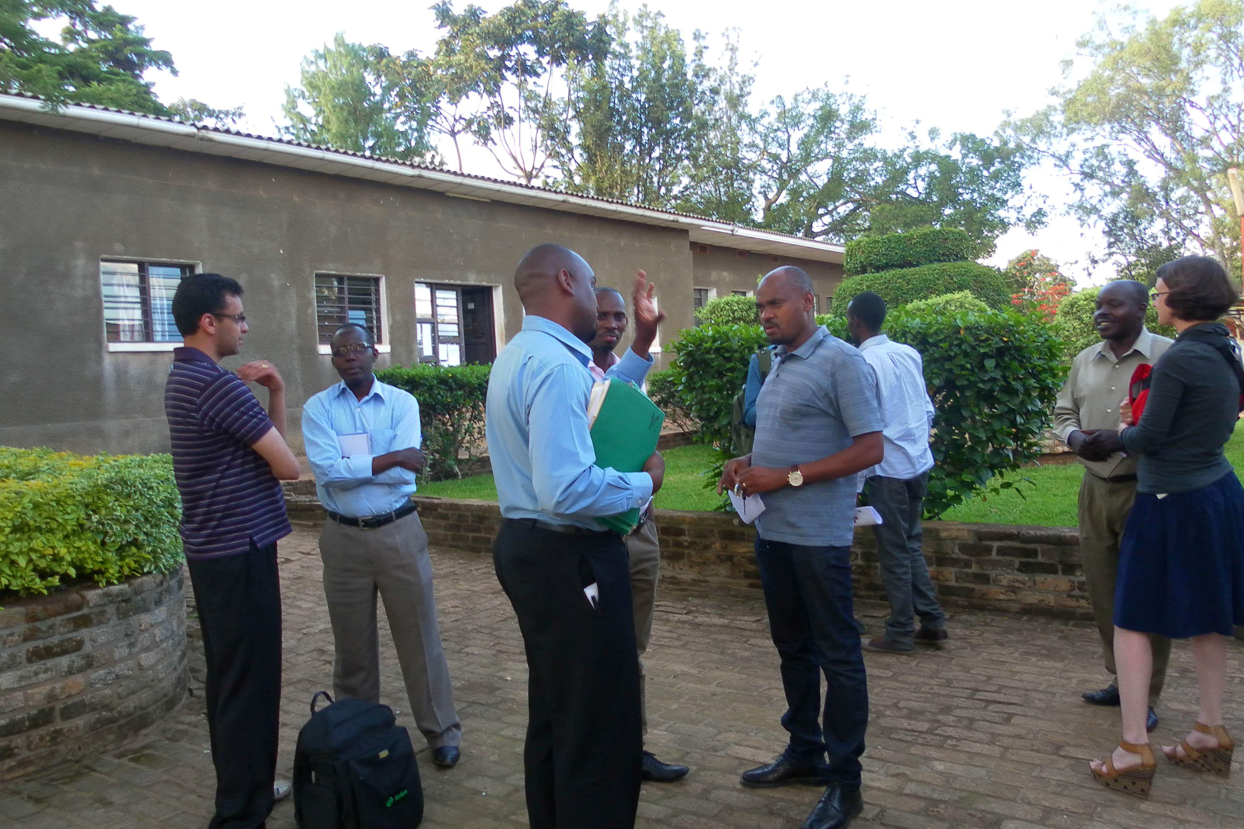 Harper faculty speaking with a group of faculty from the National University of Rwanda - Huye