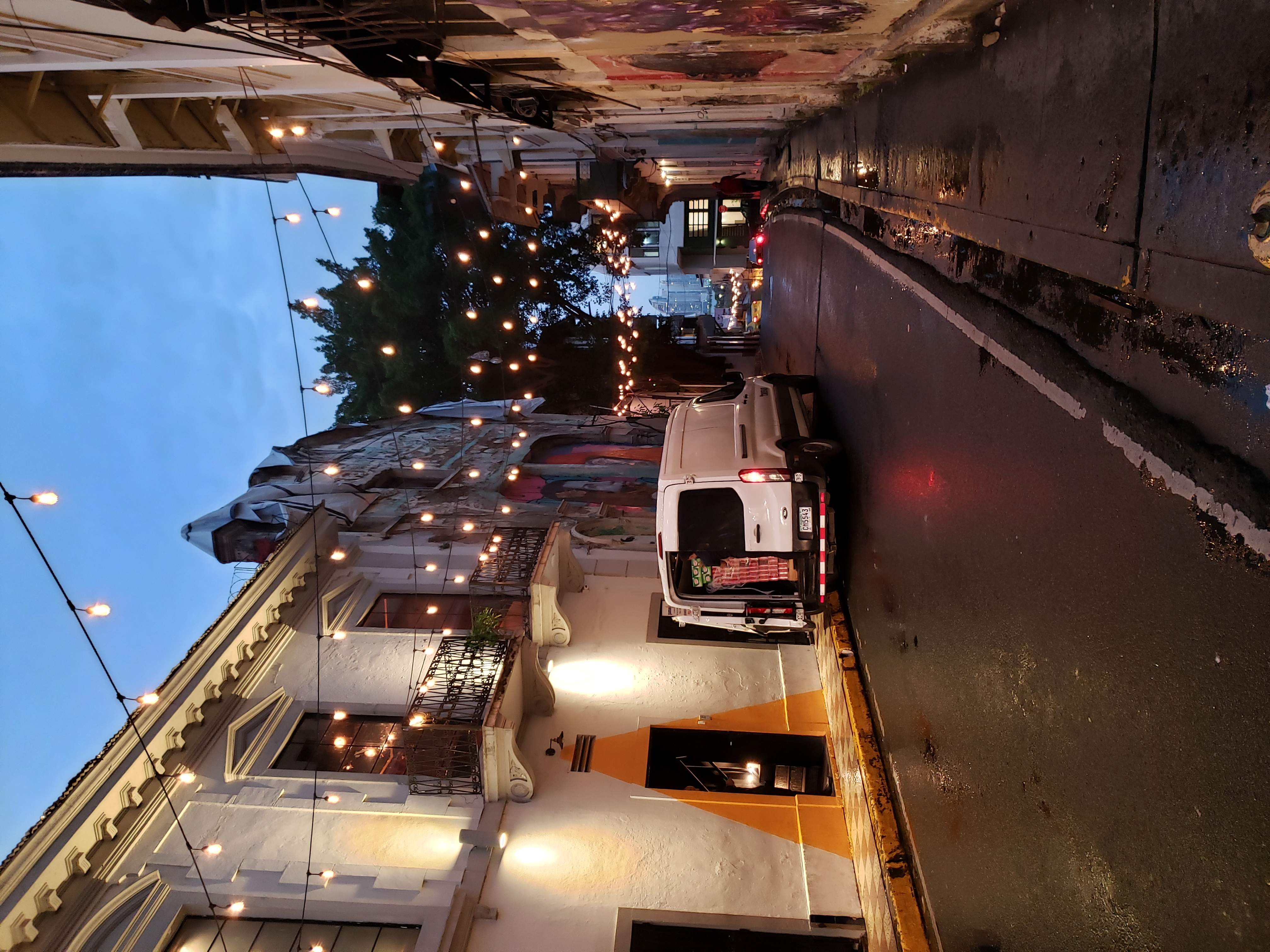 A street scene at night in Panama City, Panama with lights and old buildings