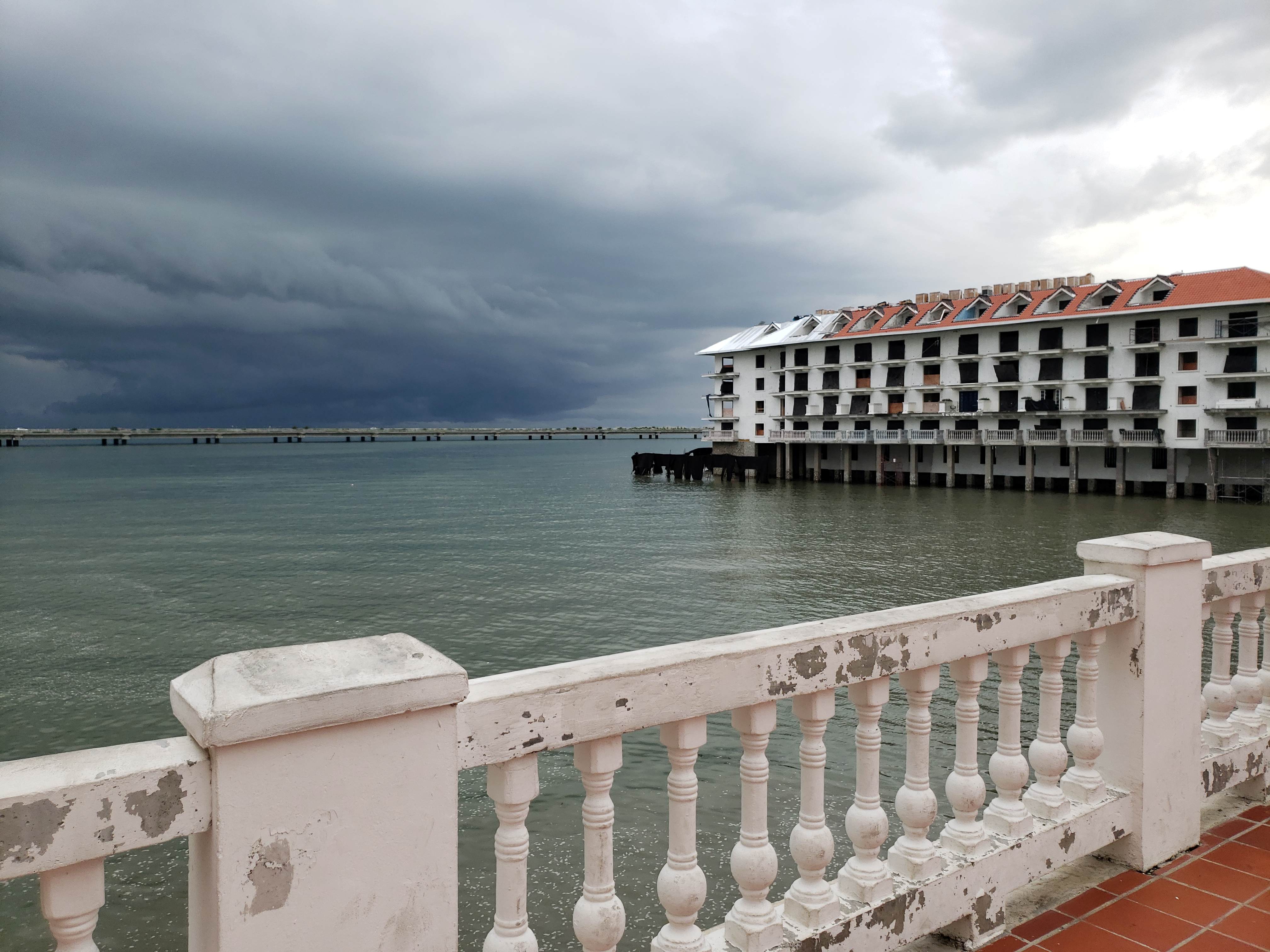 A storm with dark clouds just offshore