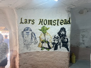 Painted Star Wars characters on the wall of an indigenous home