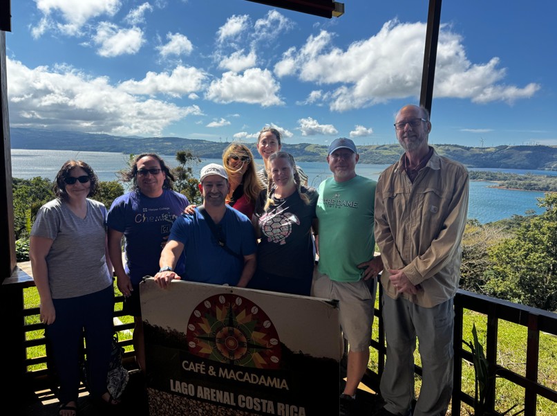 a group of students and teachers in Costa Rica smile for the camera