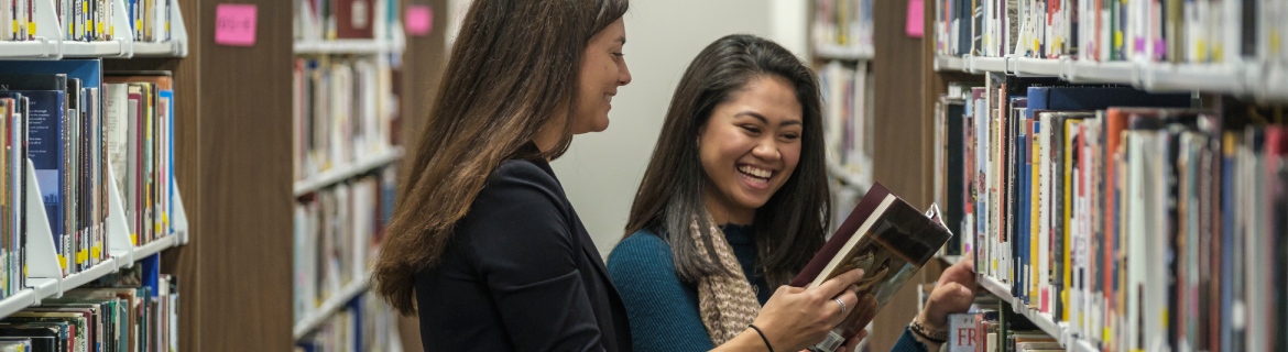 Students in Harper College's English program browse books in the library located in Building F on campus in Palatine, Illinois.