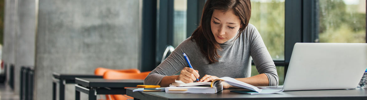 Girl studying english books