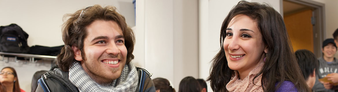 Two linguistics students sit together and enjoy class.
