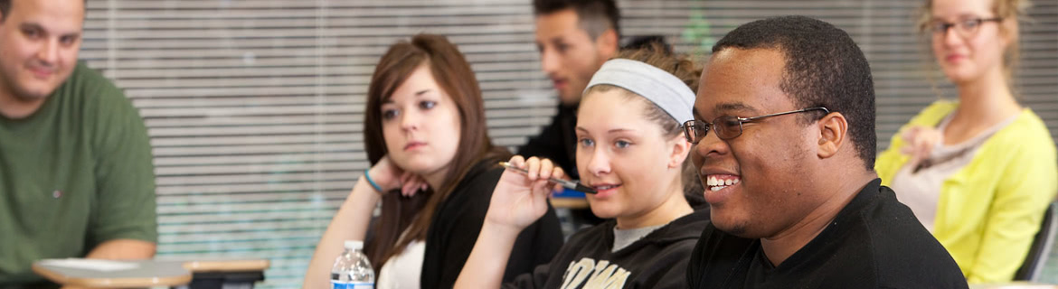 Students listen attentively to a philosophy lecture