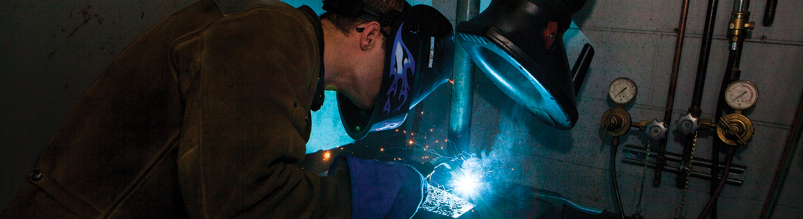 Man working with welding technology