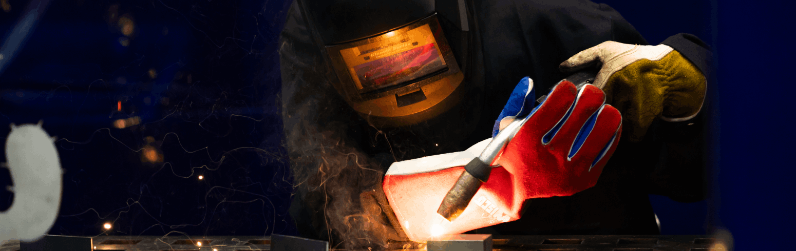 Harper Welding Certificate student practicing arc welding techniques in the Welding Technology facilities on Harper College's campus in the Chicago suburbs.