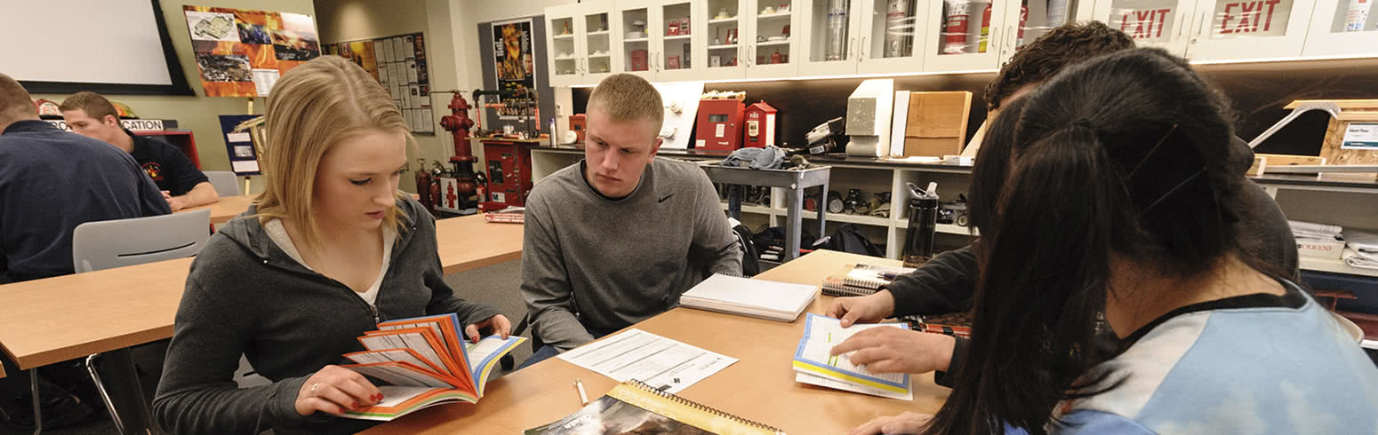 Students work as a group in a fire science class.