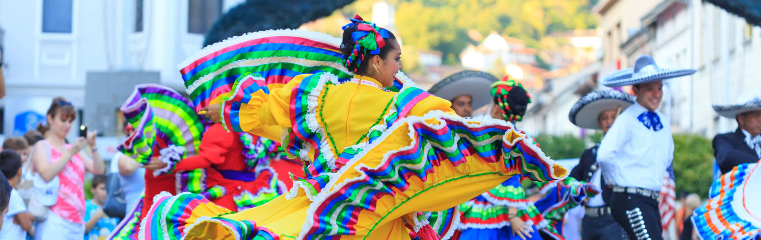 Woman in flamboyant dress of colors