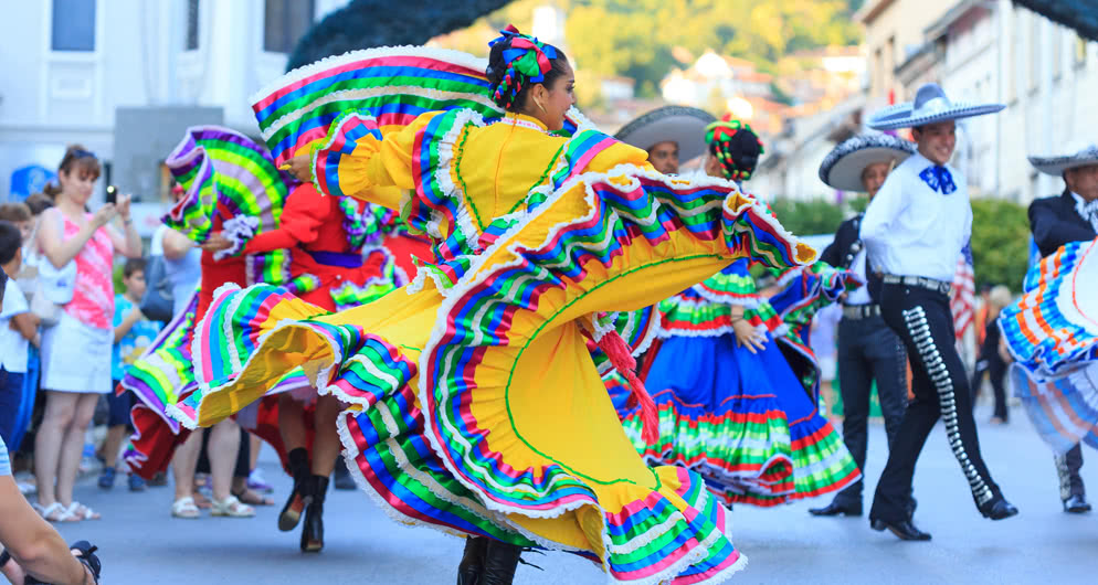 Woman in flamboyant dress of colors