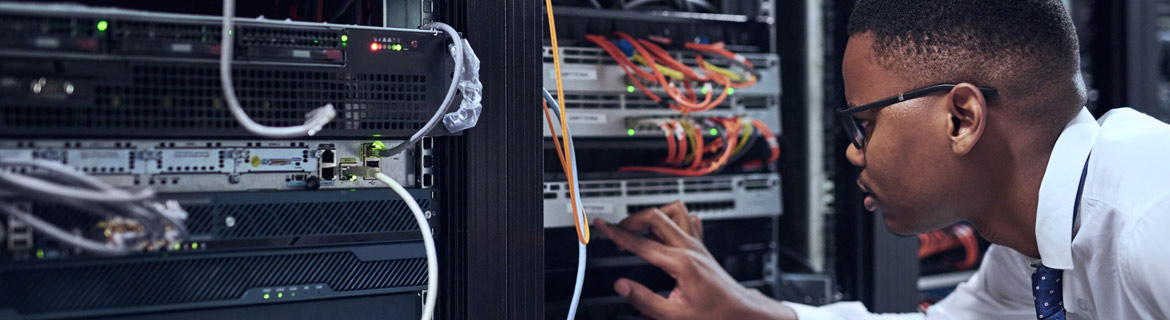 Man handling computing circuitry and its wires