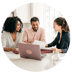 Couple getting finance advice from an accountant with a laptop