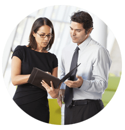 Employees look at a porfolio