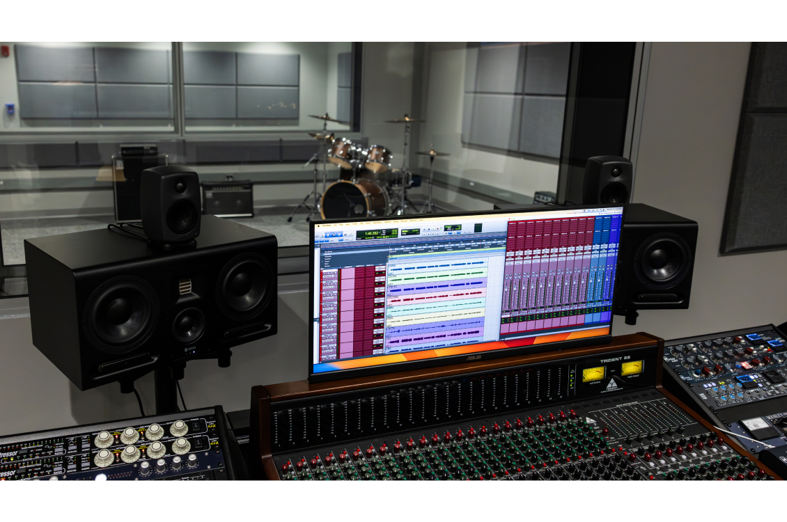 A music mixing software on the computer outside the sound booth