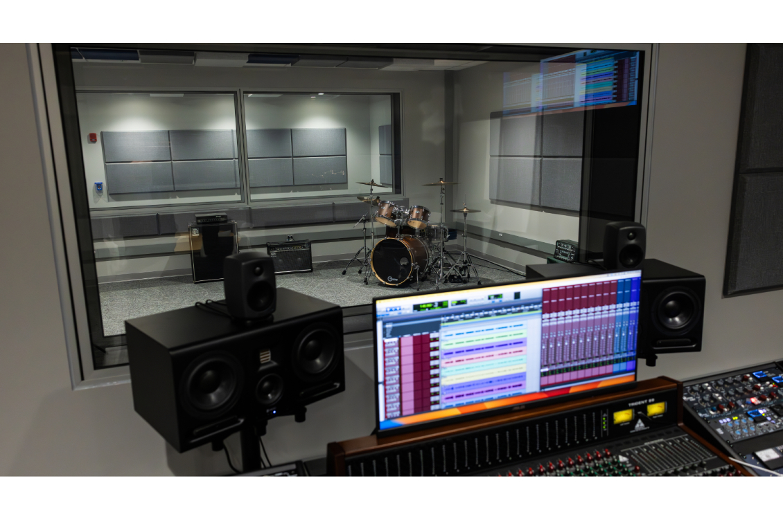 A music mixing software on the computer outside the sound booth