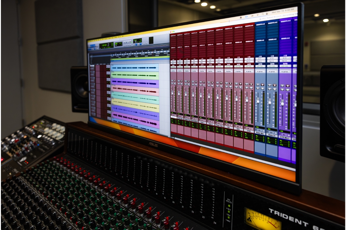 A music mixing software on the computer outside the sound booth