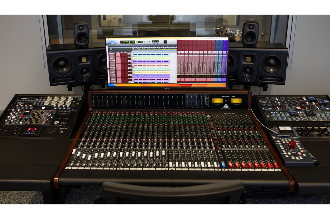 Music mixing software on a computer outside of the sound booth