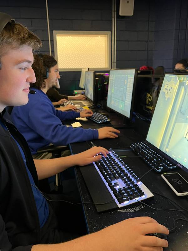 PC Playing In Gaming Lounge