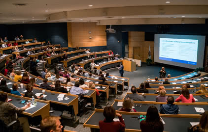 Wojcik Auditorium filled with people for a meeting